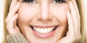A person with a bright and healthy smile, showcasing good oral health practices.